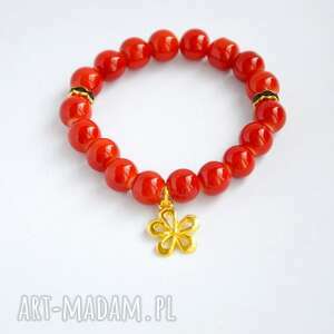 handmade bracelet by sis: złoty kwiatek w czerwonych koralach