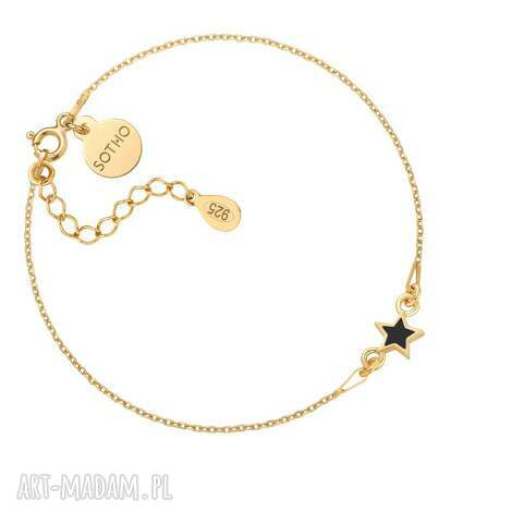 złota bransoletka z czarną gwiazdką