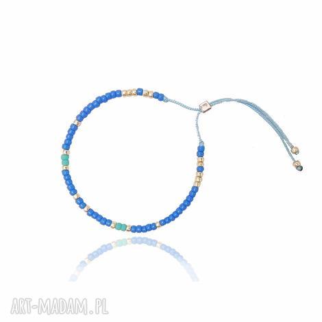 Bransoletka Minimal Blue and Gold - koralikowa, delikatna i regulowana 14-16 cm