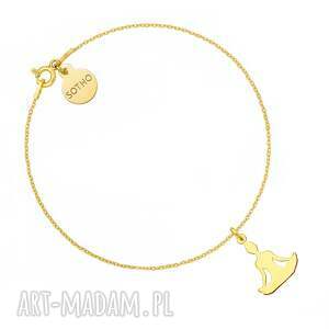 Złota z joginką w pozycji kwiatu lotosu, bransoletka