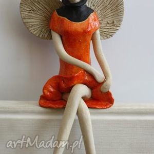 ręcznie zrobione ceramika anioł siedzący w golfie