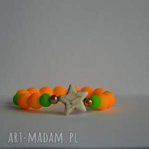 handmade gwiazda z kamienia w neonowej pomarańczy