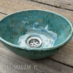 turkusowa umywalka owalna