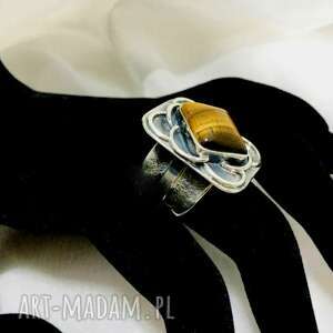 pierścionek wykonany ze srebra z kamieniem tygrysie oko regulowany z ozdobną obrączką