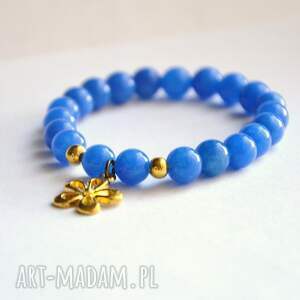 handmade bracelet by sis: niebieskie kamienie ze złotym kwiatkiem