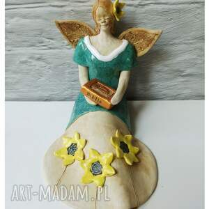 anioł z biblią, ceramika, słoneczniki