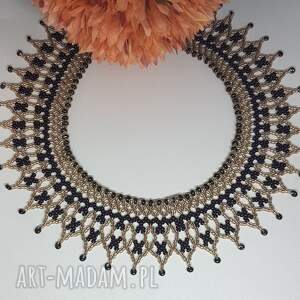 Toffi Czekoladka, naszyjnik krywulka