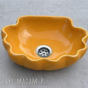 Pomarańczowa umywalka ceramiczna w kształcie muszelki