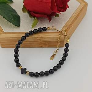 złota bransoletka z kamieni naturalnych onyks krzyżykiem elegancka, damska