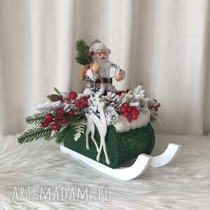 dekoracja na boże narodzenie z mikołajem stroik świąteczny w saniach światełka