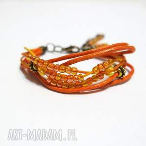 Pomarańczowa bransoletka ze sznurków i koralików handmade
