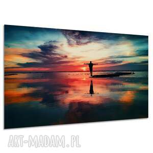 Obraz na płótnie - Człowiek 2, zachód słońca nad morzem 120x80 cm