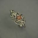 Regulowany pierścionek z kamieniem słonecznym w technice wire wrapping