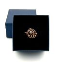 Regulowany pierścionek z miedzi z fasetowanym granatem (wire wrapping)