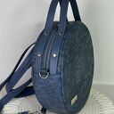 Okrągły plecak damski i torebka 2w1 z kosmetyczką - kwiaty denim