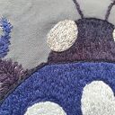 Poszewka z haftem chrząszcza -szept nocy