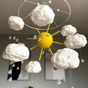 Mobil niemowlęcy z motywem słońca i chmurek - karuzela nad łóżeczko