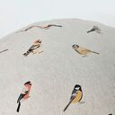 Naturalna w kolorze lnu Pufa dziecięca Leśne Ptaszki - delikatne i harmonijne