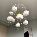 Mobil niemowlęcy z motywem słońca i chmurek - karuzela nad łóżeczko i dekoracja