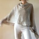 Eleganckie ponczo lniane w naturalnym kolorze