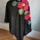 poncho w uniwersalnym rozmiarze, długość w najdłuższym miejscu 95cm w najkrótszym 55