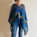 Ręcznie robione damskie ponczo - wygodna narzutka handmade