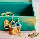 Zielony kufer boho na biżuterię z mandalą i złotymi dodatkami