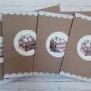 Zestaw 4 kartek wielkanocnych z życzeniami „Króliczki w koszyczkach”