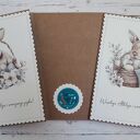 Zestaw 4 kartek wielkanocnych z życzeniami „Króliczki w koszyczkach”