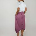 Asymetryczna spódnica bombka z kieszeniami