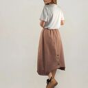 Asymetryczna spódnica bombka z kieszeniami