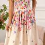 Rozkloszowana sukienka w kwiaty Cechy szczególne: dekolt płytki, okrągły, ozdobny rękawek z podwójną warstwą tkaniny - motylkowy