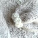 Kardigan Fleur marcepan kwiaty koronki falbanki ozdobne guziki