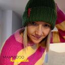 Wełniany sweter w paski robiony na drutach