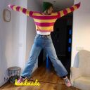 Wełniany sweter w paski robiony na drutach