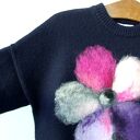 Ciepły granatowy sweter oversize S z filcowanym kwiatem