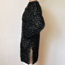 Prosty, elegancki sweter handmade - niska stójka i czarny melanż