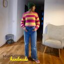 Wełniany sweter w paski robiony na drutach