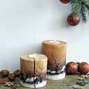 Dwa drewniane świeczniki z zimowym pejzażem