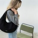 Czarna torba HOBO OVAL z nubuku tapicerskiego - mała na ramię