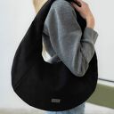 Czarna torba HOBO OVAL z nubuku tapicerskiego - mała na ramię