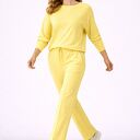 Komplet damski Mila w kolorze żółtym - bluza wiązana i spodnie z kantem