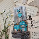 Rustykalny wieszak z tukusowymi domkami No 1