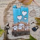 Rustykalny wieszak z domkami no 1