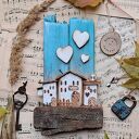 Rustykalny wieszak z domkami no 1