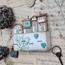 Rustykalny wieszak z niezapominajkami