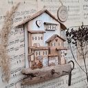 Rustykalny wieszak z jasnym miasteczkiem no 1