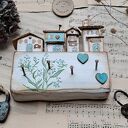 Rustykalny wieszak z niezapominajkami