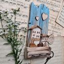 Rustykalny wieszak z domkami no 1