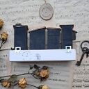 Wieszak z czarnymi domkami no 1